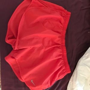 Red Nike shorts